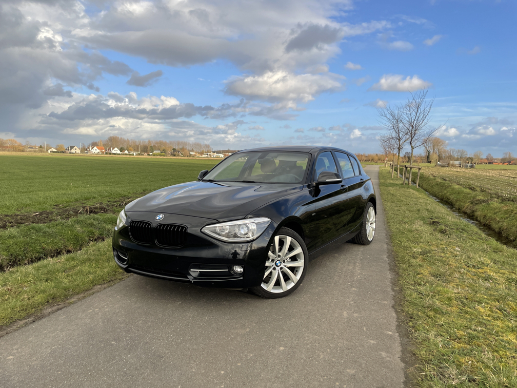 BMW 118d photo 1